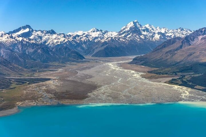 Breathtaking views of Aoraki Mount Cook and the stunning landscapes of Lord of the Rings country await. Experience luxury helicopter flights and capture unforgettable memories amidst snowy peaks and serene waters.